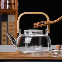 Théière en verre borosilicate de 1L, fabriquée à la main, soufflée à la bouche, écologique, résistante à la chaleur, ensemble de thé aux fleurs, couvercle en bambou de luxe