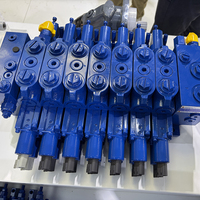Vanne sectionnelle hydraulique proportionnelle multi-voies à détection de charge et partage de débit pour plateforme aérienne