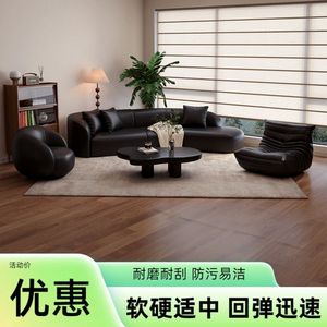 โซฟาหนังโค้งมน ดีไซน์หรูหรา สีดำ สำหรับห้องนั่งเล่นหรือสำนักงาน - Product Image 5