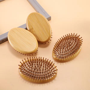 Cepillo de masaje capilar de madera de nanmu con cojín elástico para el cuidado de los meridianos de la cabeza y un cabello suave - Product Image 4