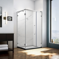 Cabine de douche d'angle sans cadre sur mesure avec porte battante en verre pour salle de bain