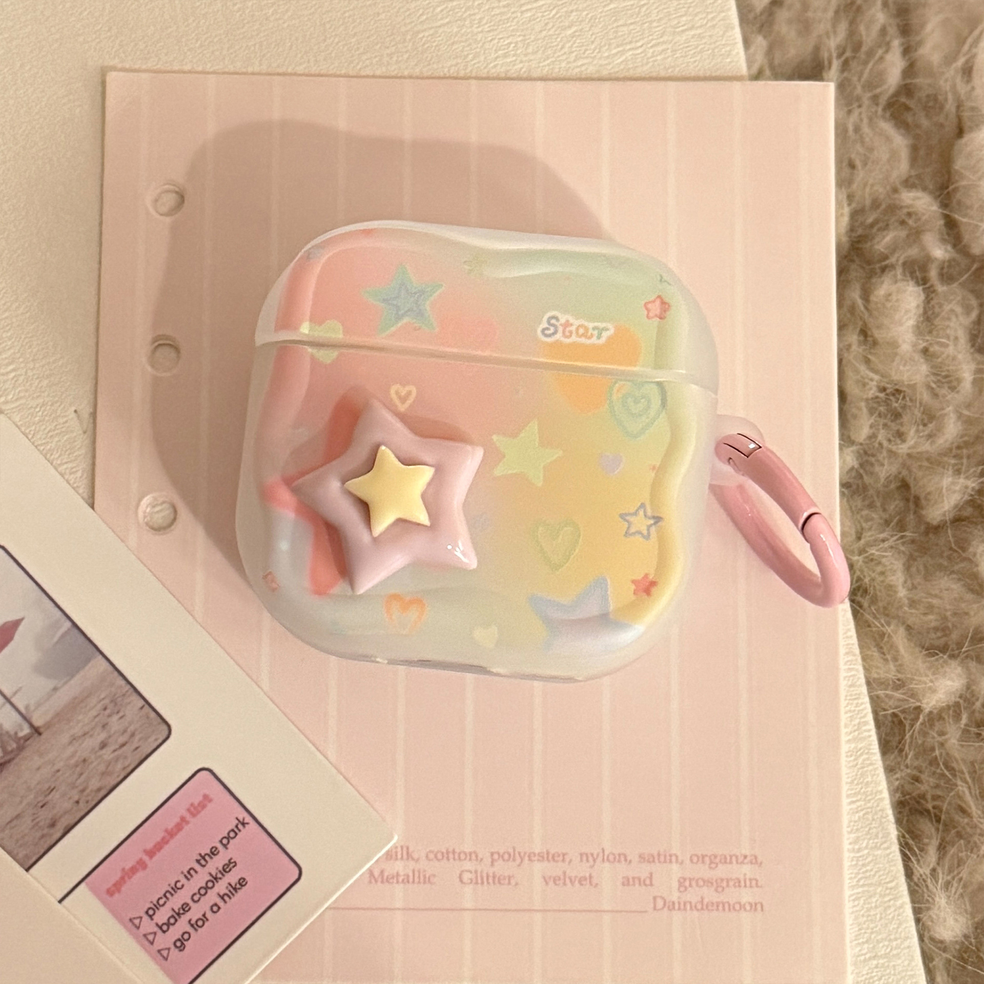 Colorful 3D purple and yellow star, light pink hanging ring