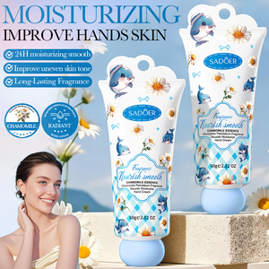 Crème pour les mains à la camomille, hydratante et adoucissante pour les mains sèches, améliore le teint terne, emballage mignon en forme de dauphin, vente en gros personnalisée, directement de l'usine - Product Image 1