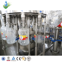 Machine de remplissage automatique d'eau en bouteille de 5L et 10L, machine de production d'eau minérale en bouteille plastique, projet clé en main 3 en 1