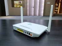 HG6821M peralatan serat optik Xpon, ONU FTTH rumah NT 2.4G/5G nirkabel 4GE + 2USB + 1pot + WIFI Gpon Onu dengan 2 antena HG6821M