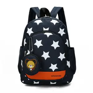 Bolso de hombro con estampado de estrellas de gran capacidad de alta tendencia, mochila impermeable con patrón de estrellas, mochila escolar con monedero