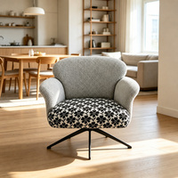 Fauteuil de salon rembourré avec dossier et accoudoirs, coussin d'assise floral, base en métal noir, hauteur réglable, pivotant