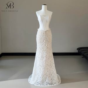 فستان زفاف من قطعتين من ميلي برايدل MQW02236 بتصميم حورية البحر مع تنورة مزينة بالخرز ودانتيل وصدر من الساتان بدون أكمام على شكل قلب وتصميم الكورسيه - Product Image 1