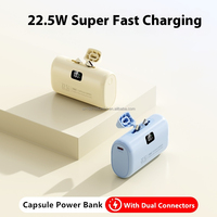 Mini banco de energía 10000mAh con dos enchufes giratorios Pantalla digital PD 20W Cápsula de carga rápida Cargador portátil Salida de