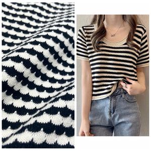 قشور السمك خيوط سوداء وبيضاء صبغ قطن بوليستر رايون مطاطي نسيج سويتر Hacci 280GSM - Product Image 6