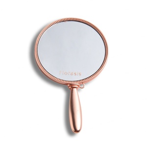 Miroir de maquillage de luxe en or rose avec poignée, personnalisable avec logo, fabriqué par Mirror Manufacturer - Product Image 1