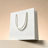 Sacs d'emballage pour vêtements de luxe personnalisés, sacs en papier kraft blanc avec poignées, sacs de shopping durables, machine de fabrication