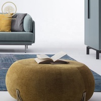 Rembourrage en tissu de haute qualité, repose-pieds courbés et chaise à bille