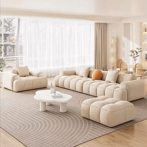 โซฟาถักดีไซน์อิตาลีสุดหรูทันสมัยจากโรงงาน Foshan โดยตรง - เตียงแบบโมดูลาร์หุ้มหนัง ผ้า และไม้ พร้อมฟองน้ำสำหรับห้องนั่งเล่น - Product Image 3