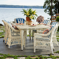 Ensemble de mobilier de salle à manger en rotin, table et chaises en osier tressé pour complexe hôtelier extérieur