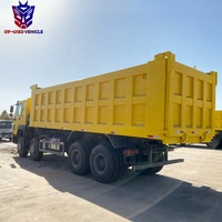Sinotruk Howo 8x4 baru truk sampah berat Camion Benne Basculante Volquete Euro 5 standar emisi Diesel weiyai mesin kiri