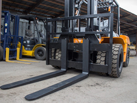 Chariot élévateur diesel CPCD70-G en promotion avec 4 roues motrices et fourches de 1220 mm pour les magasins de matériaux de construction