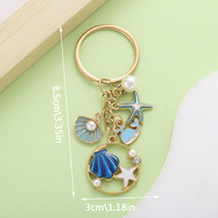 Porte-clés en alliage en forme de goutte d'huile, étoile de mer, dauphin, coquillage, pendentif cadeau, bijou de sac pour fille, exquis et haut de gamme