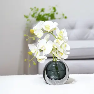 Orchidea artificiale in vaso verde pianta bianca di orchidea finta in vaso fiori bianchi con vaso