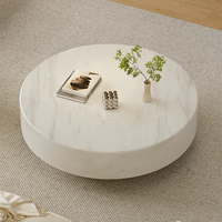 Table basse en marbre italien, de forme ronde, adaptée au salon, à un usage domestique, design minimaliste, style haut de gamme, couleur crème