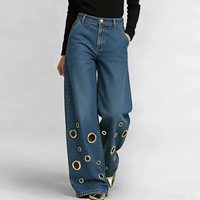 Pantalon en jean taille haute à jambes larges, boutonné, avec poches évidées, couleur unie