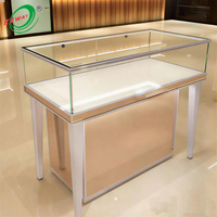 Vitrines de présentation de bijoux en or sur mesure avec verre trempé et vitrine de présentation de bijoux haut de gamme pour boutique de détail