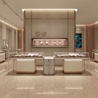 Ensemble de comptoirs de présentation de bijoux de luxe GZowin avec dimensions personnalisables, verre trempé, éclairage LED, finition dorée pour les magasins de détail