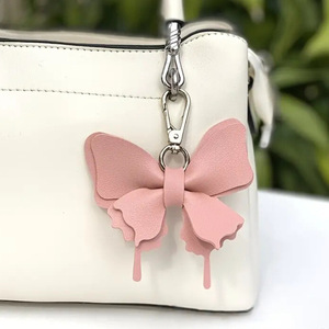 Cross-border spot PU leather bow keychain pendant ornament, fresh and colorful butterfly-shaped <b>bag</b> <b>charm</b> - Product Image 4