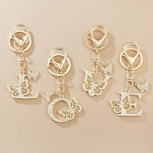 Llavero de Aleación de Zinc Chapado en Oro con Forma de Mariposa y Letra Inicial M, Impermeable, Ligero, para Mujeres y Niñas, con Cristales - Product Image 2