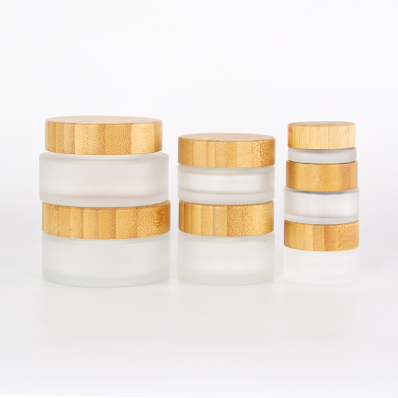 Hot selling natural 100g 50g 30g 15g 5g engravable frosted glass cosmetic facial cream jar with bamboo lid