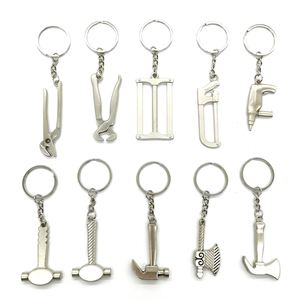 CY Wholesale Mini outils multifonctions en métal : hache, faucille, marteau, règle, porte-clés - Product Image 1