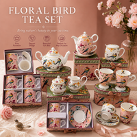 Ensemble de tasses à café en céramique rose avec assiettes, théière et cuillère, idéal pour les cadeaux d'affaires