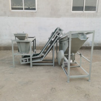 Machine de traitement des noix de cajou Machine de séparation en acier inoxydable Machine de séparation de noyau de palme et de coquille