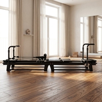 Machine de Pilates Xformer Reformer portable et réglable en aluminium noir durable pour la santé, le fitness, les studios et les salles de sport