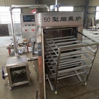 Four industriel multi-étapes pour la cuisson, le fumage, le séchage et le refroidissement intégrés de la viande, du poisson et de la volaille