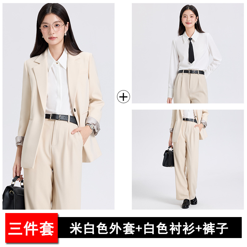 off-white suit, white shirt and trousers