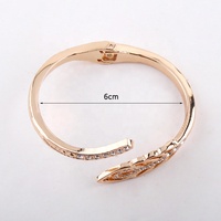 Bracelet jonc ouvert en alliage plaqué or de haute qualité pour femme, orné de strass et motif feuille, de Guangzhou