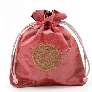 Embroidered burning sun pattern Chinese silk brocade drawstring jewelry pouch gift bag