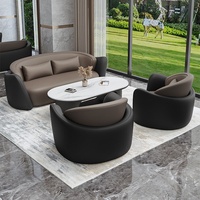 Ensemble de canapés commerciaux haut de gamme en cuir noir et marron avec table basse en marbre, mobilier pour hall d'hôtel