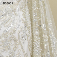 Tissu de dentelle de mariage en polyester fait main par un fabricant chinois avec perles, broderie de luxe et sequins pour robes
