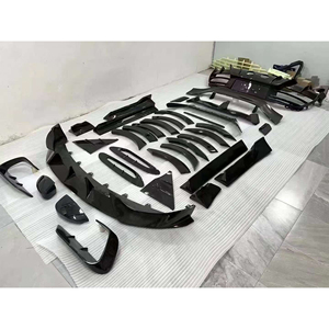 Nuevo Kit de Carrocería Estilo Mansori, Parcialmente en Fibra de Carbono, Acabado Brillante, Tejido Twill, Precisión 1:1, Alerón Delantero, Parachoques Trasero, Escape, Aston - Product Image 1
