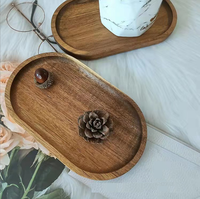 Petite assiette de service ovale en bois d'acacia