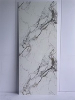 Panel de Pared para Ducha de PVC con Acabado Mármol Calcatta Brillante de 1/1.2m, Panel Decorativo para Baño de la Mejor Calidad, Impermeable y con Protección UV