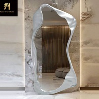 Miroir sur pied de luxe français au design irrégulier en métal pour salon et couloir, miroir décoratif artistique créatif post-moderne haut de gamme