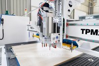Centre d'usinage CNC TechPro 5+4 avec boîte à outils automatique pour le travail du bois, la découpe et la gravure de panneaux de meubles