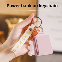 Banque d'Énergie Mini Porte-clés en Cuir Double Câble d'Usine Portable Compatible Type C pour iPhone Xiaomi Batterie 2000 mAh