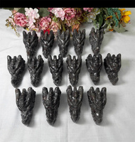 Vente en gros de pierres précieuses réactives aux UV Yooperlite naturelles Cristal Poli Tête de dragon Crânes Sculpture