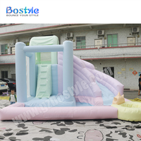 Maison de rebond en PVC de couleur pastel toboggan gonflable piscine enfants fête en plein air château plein d'entrain avec fosse à balles et toboggan à vendre