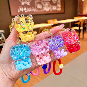 Porte-clés créatif ours en PVC rempli d'huile tasse à thé laiteuse perles lumineuses bouteille de sable mouvant mignon sac à main pendentif Anime accrocher - Product Image 2