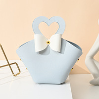 Boîte à bonbons de mariage en cuir portable créative Mini sac à main Style sac cadeau pour la distribution de faveurs de mariage Bonbons de Noël